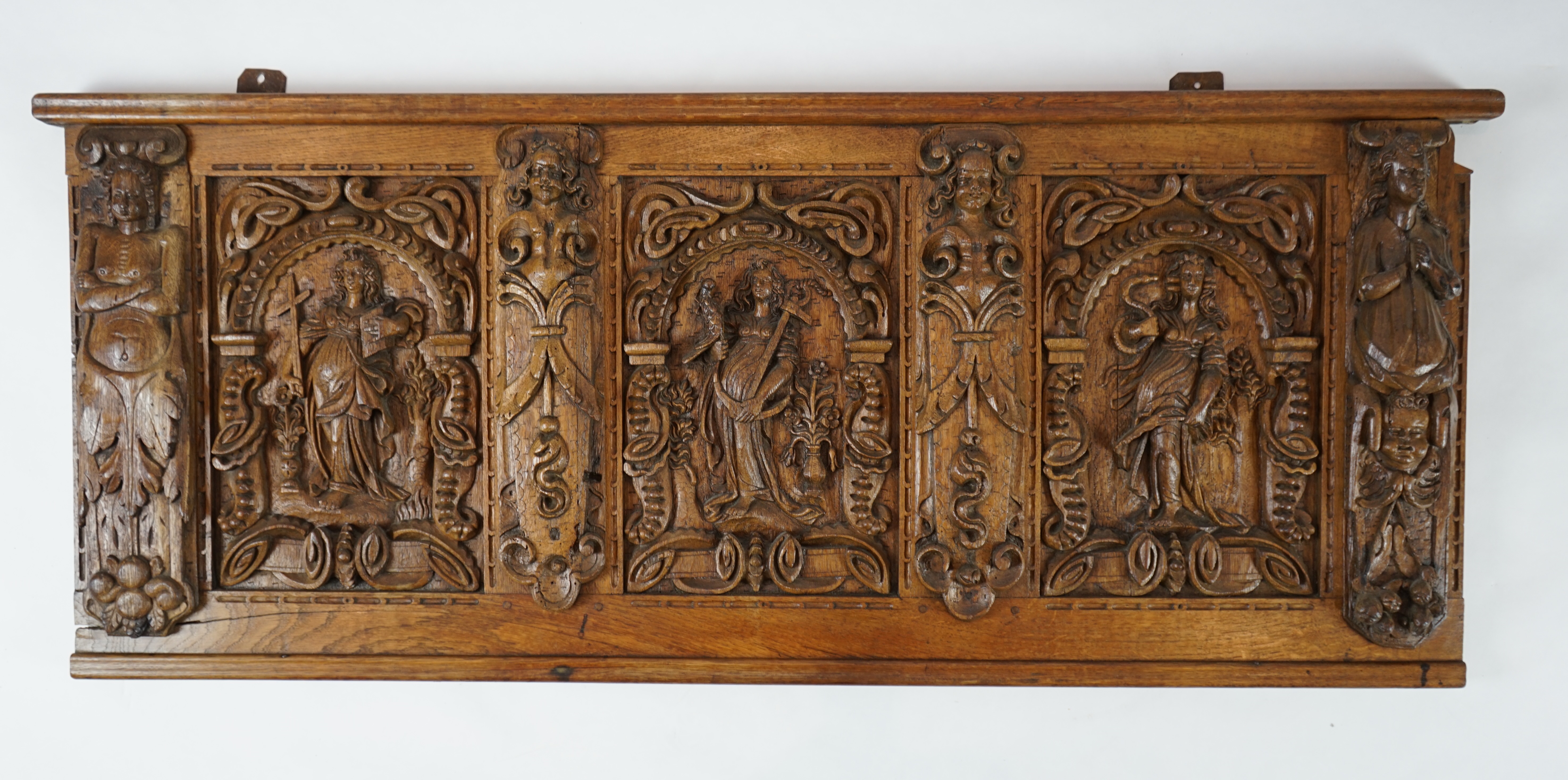 A 17th century and later Flemish carved oak panel